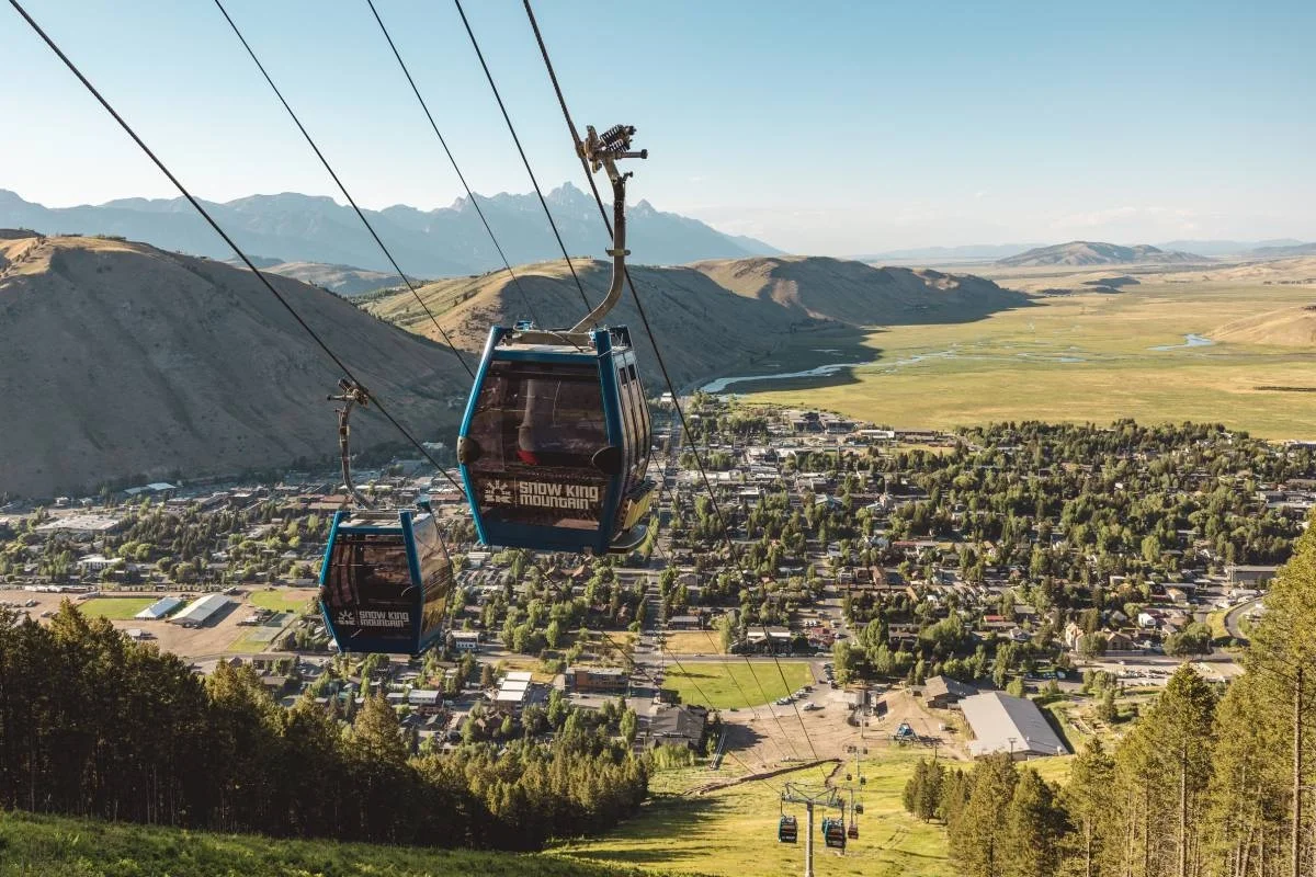 Snow King Mountain in USA - a cable car in the mountains above a small town.