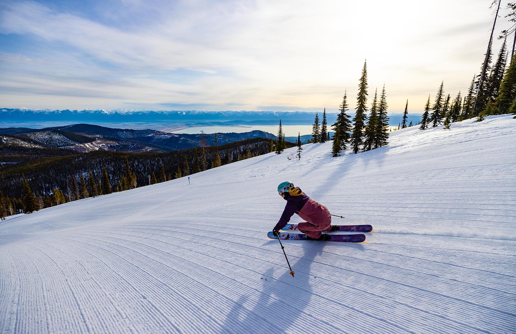 Blacktail Mountain in USA - a person on a snowboard going down a hill.