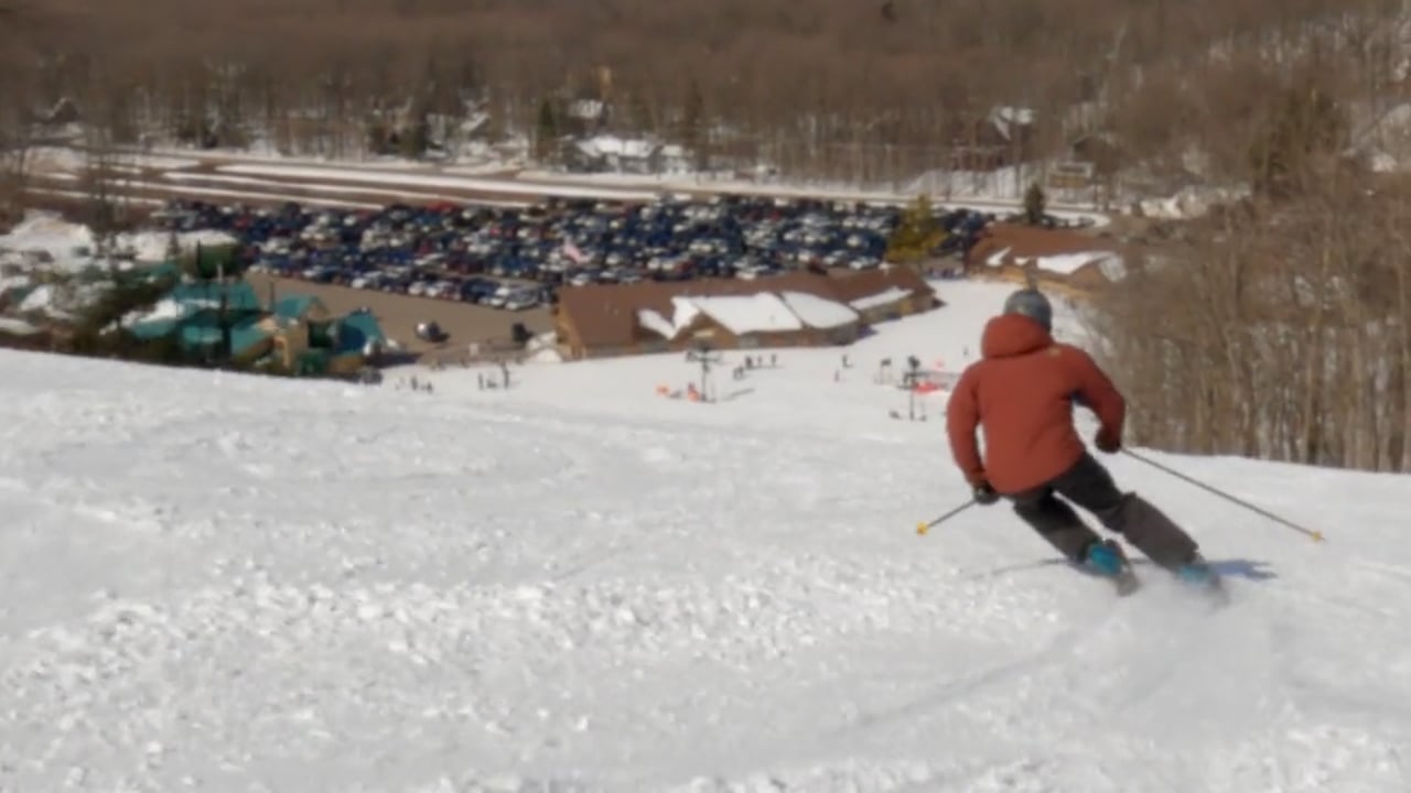 Nub's Nob Ski Area in USA - a person skiing down a snowy hill.