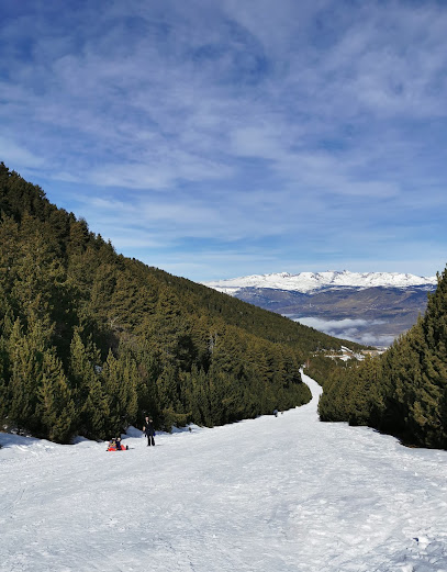 A scenic winter view of Puigmal in France, featuring a charming chalet, a bustling winter sports scene within a ski resort, surrounded by beautiful snow-filled landscape.