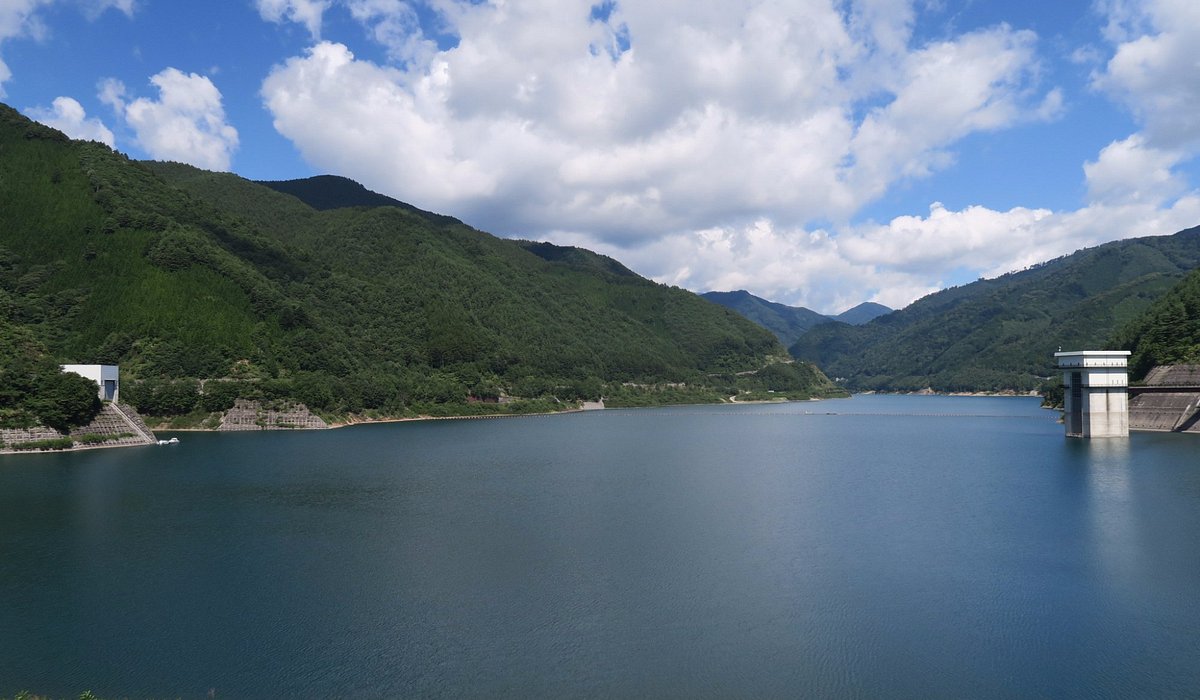 Yabuhara Kogen in Japan - a large body of water surrounded by mountains.