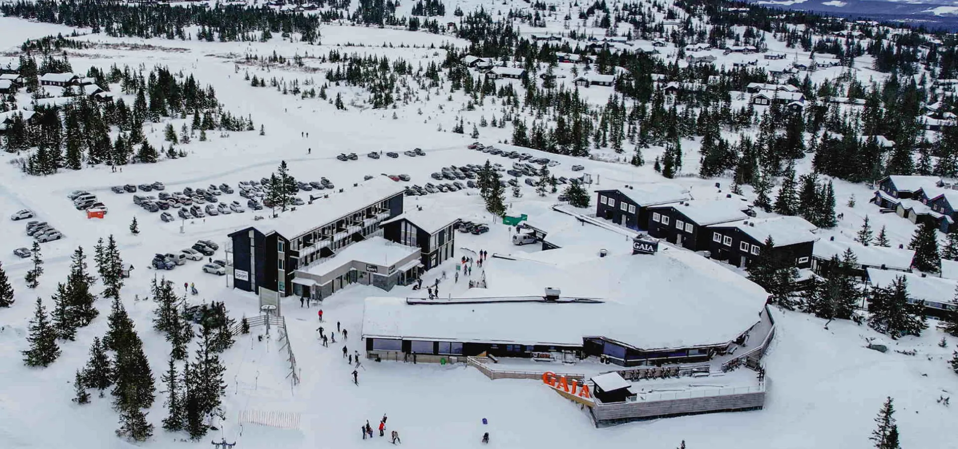 Hafjell in Norway: a ski resort surrounded by trees and snow.