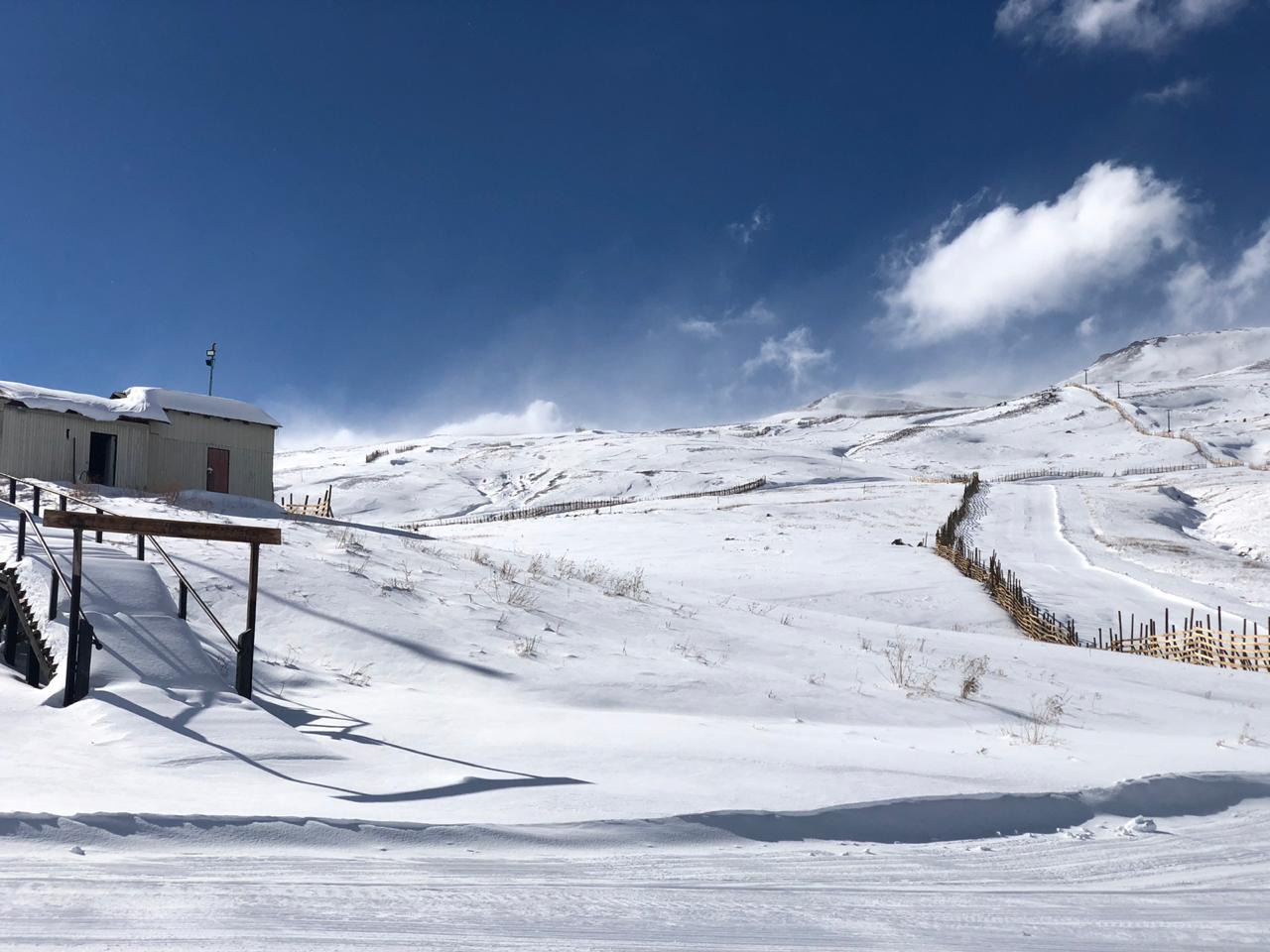 Chapa Verde in Chile - a house in the middle of a snow covered mountain.