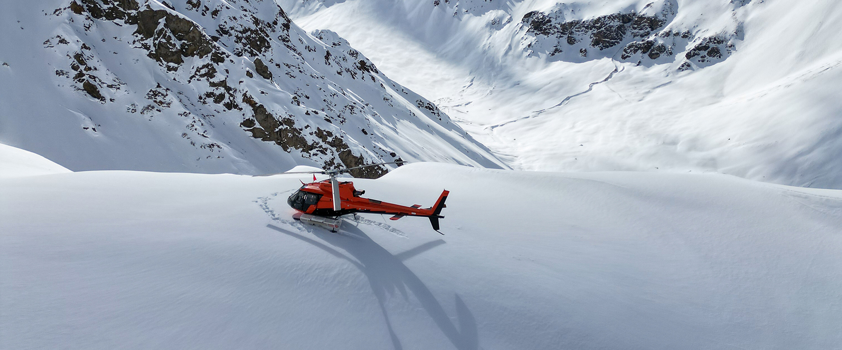 Portillo in Chile - a person skiing down a snowy mountain.