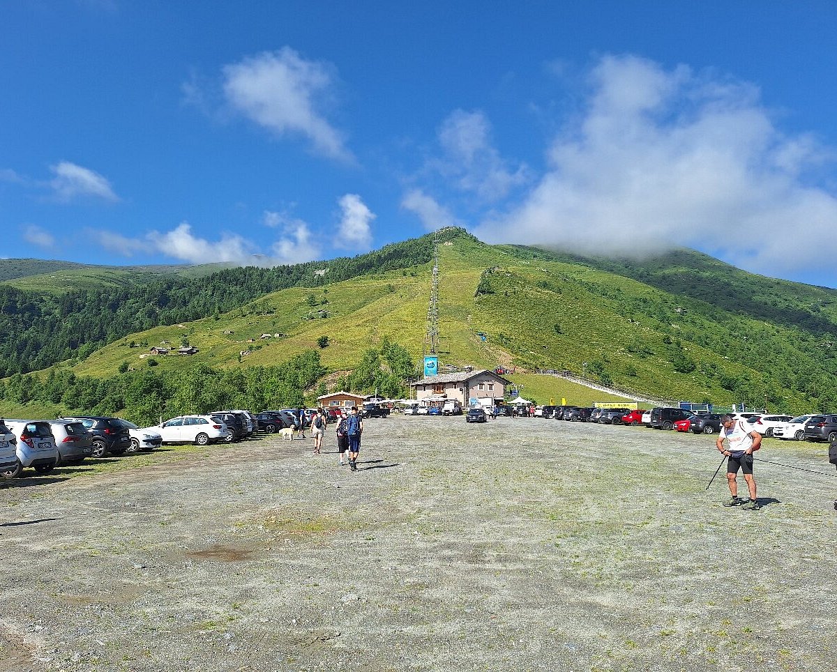 Pian Munè – Paesana in Italy - a group of people standing on top of a mountain.