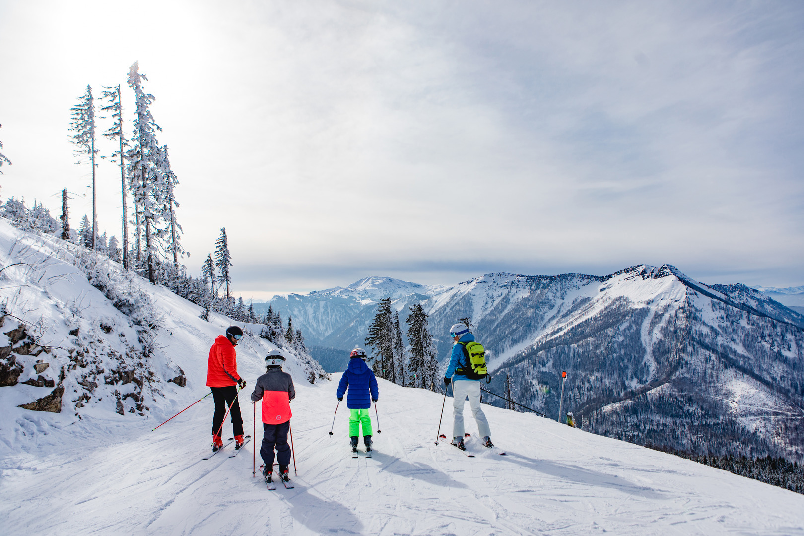 Ötscher – Lackenhof in Austria - a group of people skiing down a snowy slope.