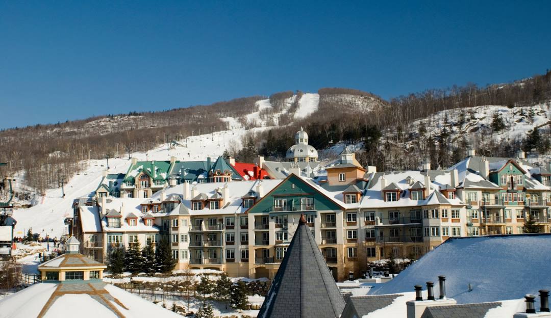 Mont-Tremblant in Canada - snow covered houses in the mountains.