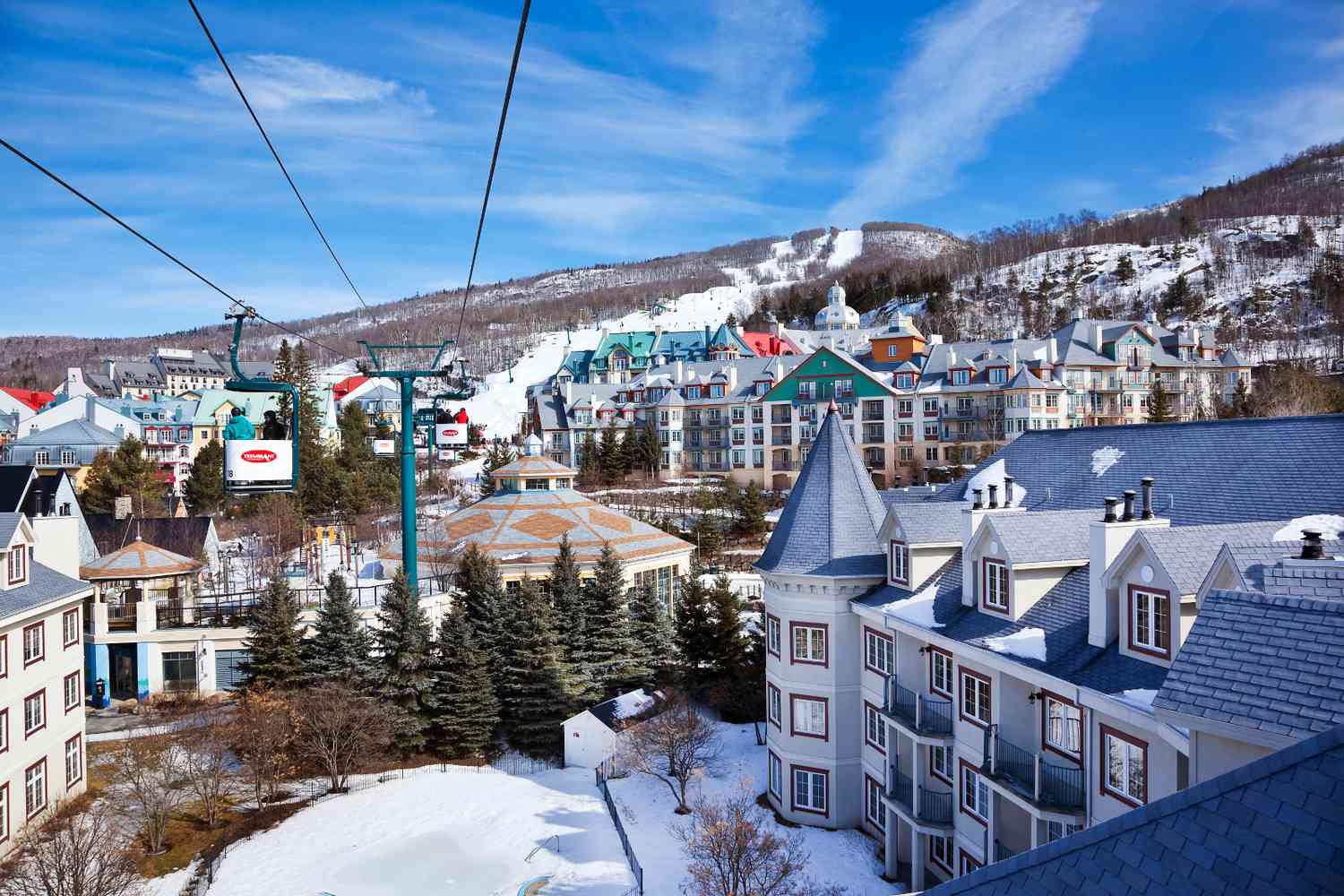 Sommet Morin Heights in Canada - a ski lift going up the mountain.