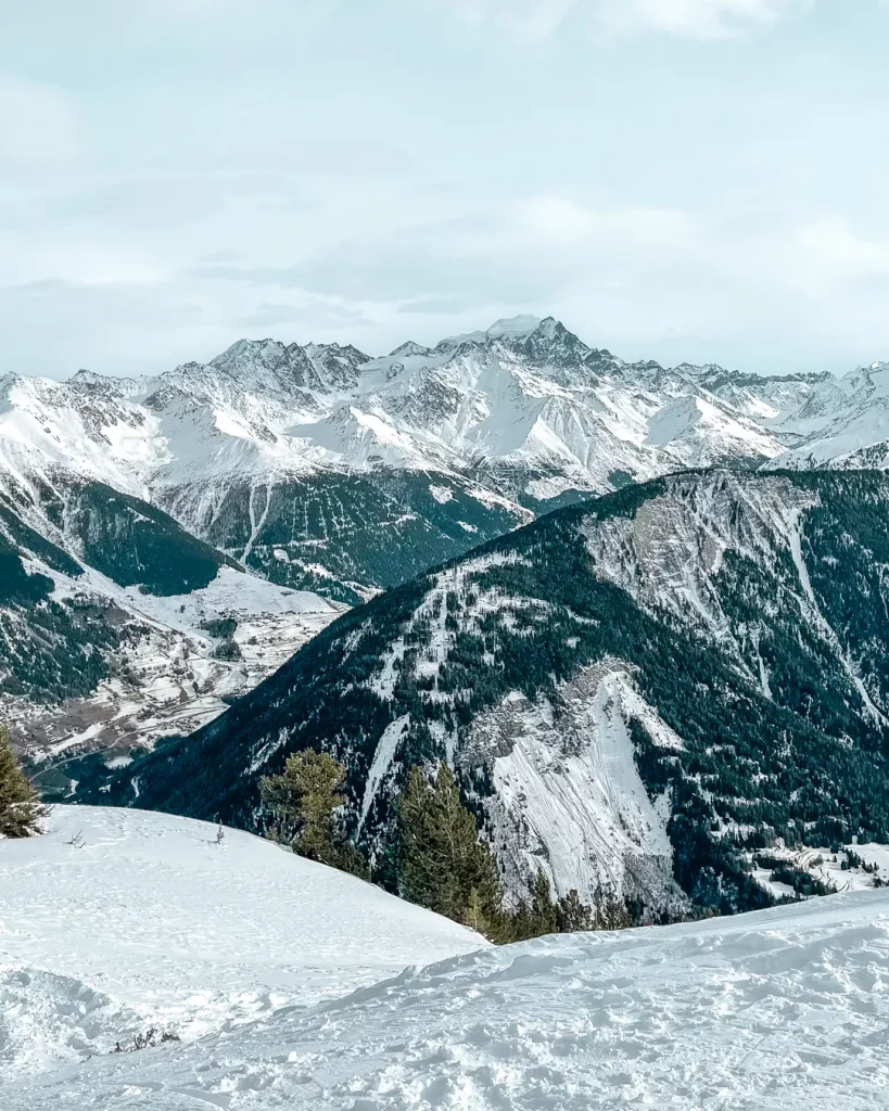 Champex-Lac in Switzerland - the mountains are covered in snow.