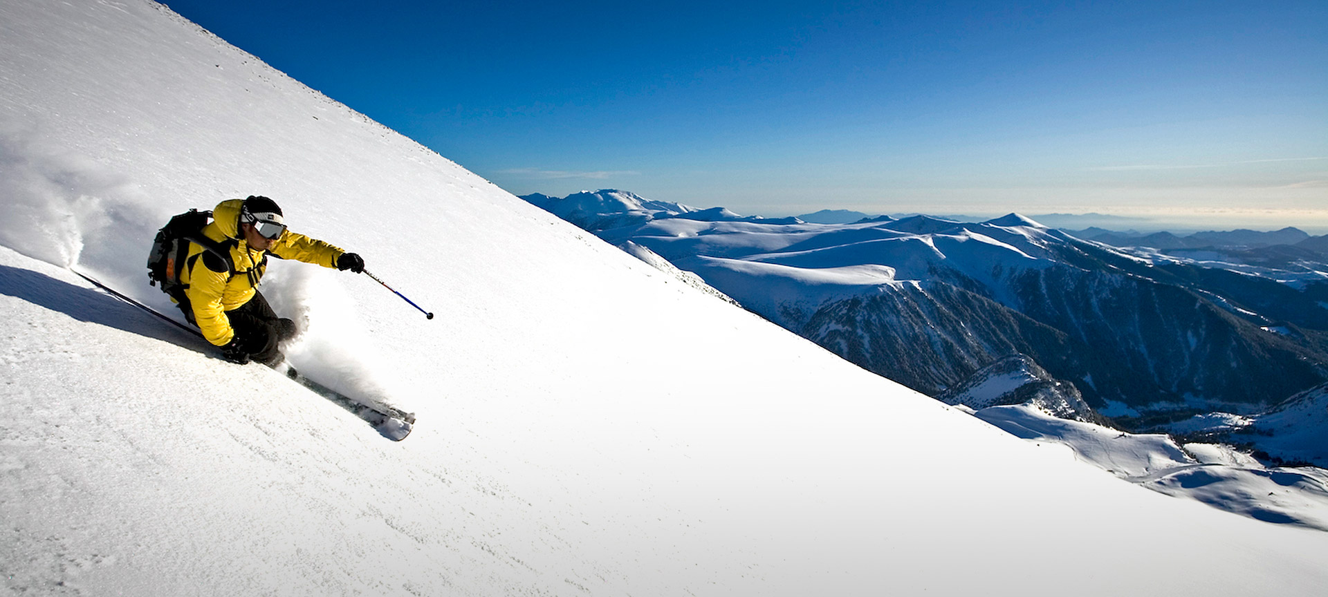 Vallter 2000 in Spain - a person skiing down the side of a mountain.