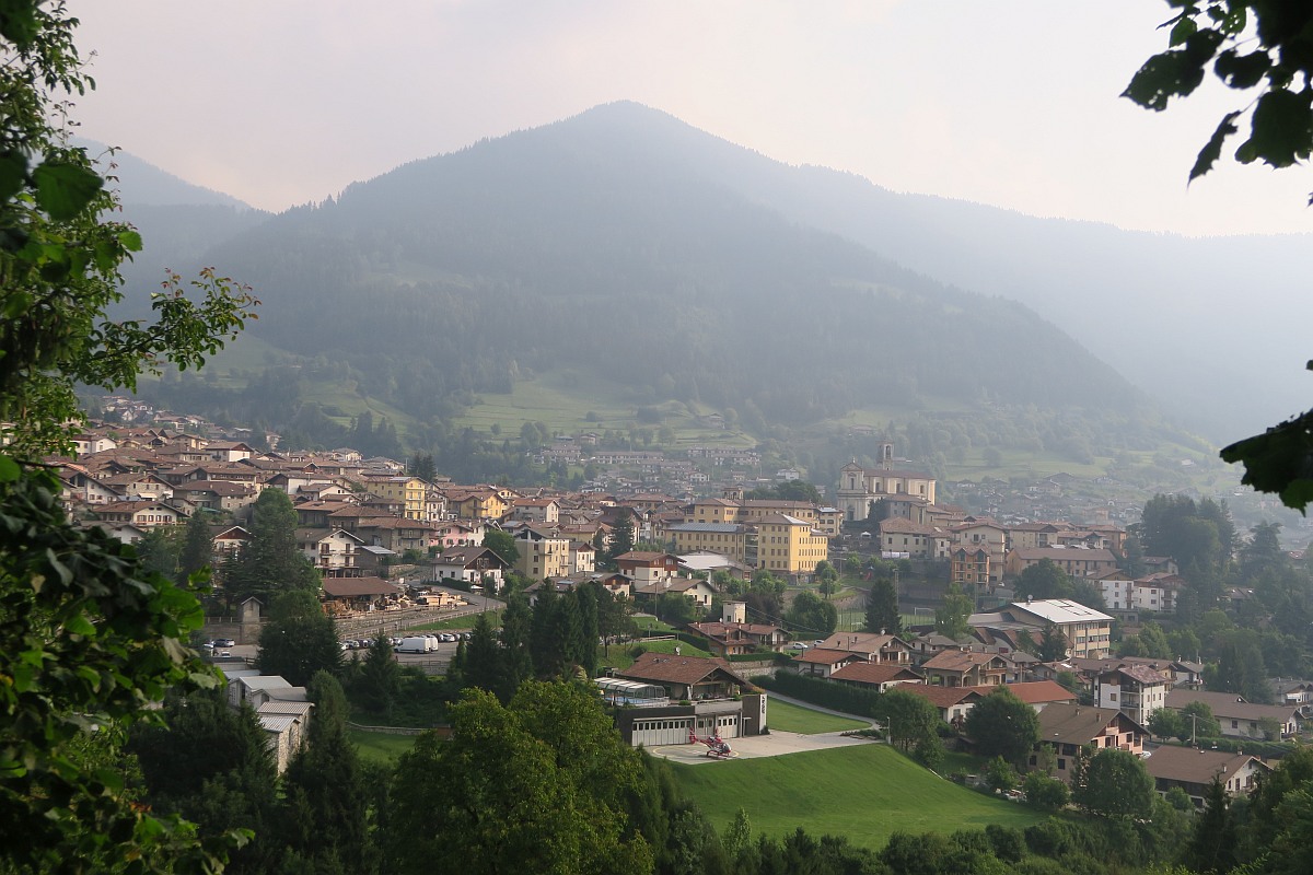 Borno – Monte Altissimo in Italy - a small town surrounded by trees and mountains.