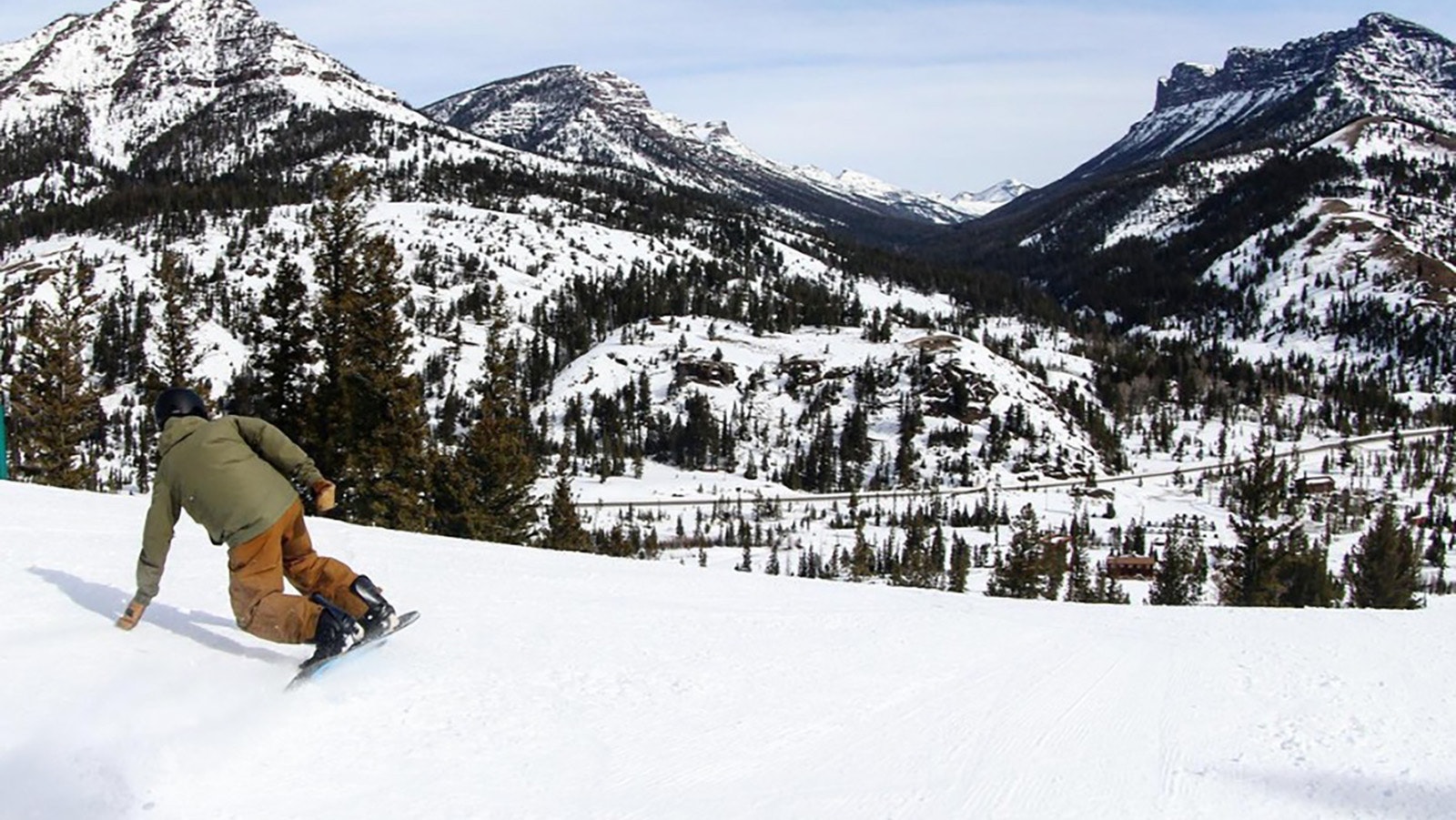 Sleeping Giant in USA - a person on a snowboard going down a hill.