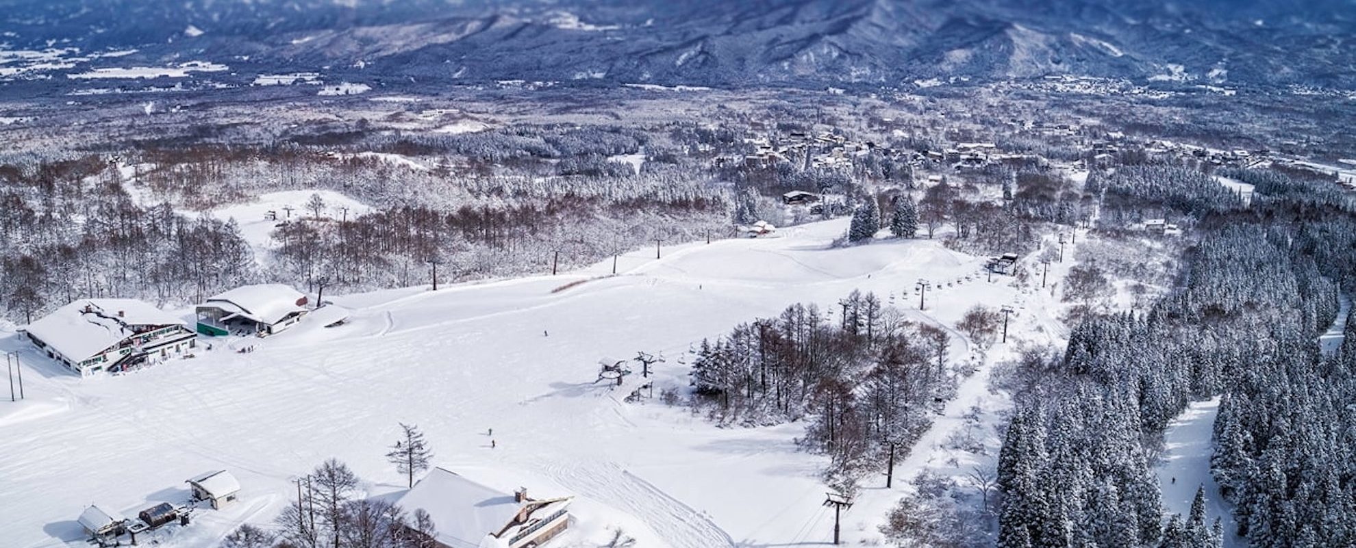 Ikenotaira Onsen in Japan: an aerial view of a ski resort in the mountains.