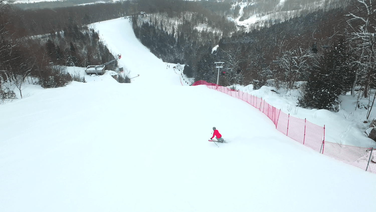 Beaver Valley Ski Club in Canada - a person on a snowboard going down a hill.