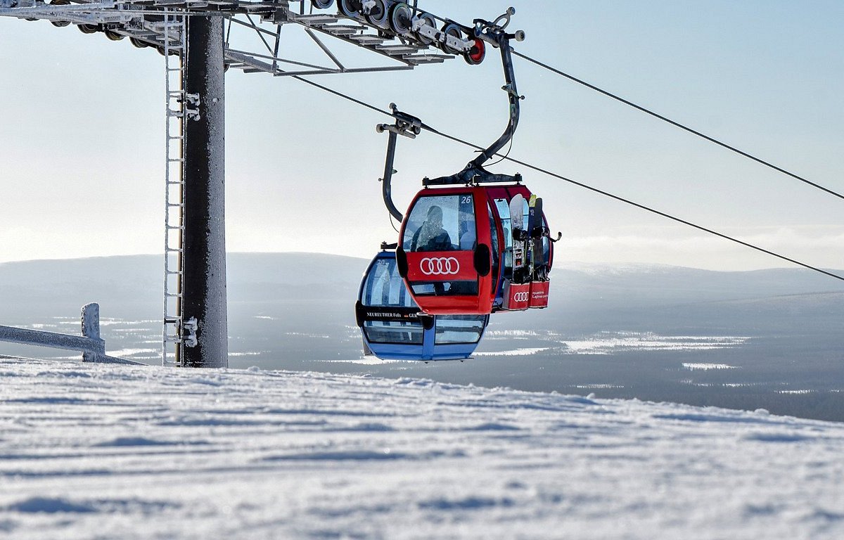 Oy Levi in Finland - a ski lift going up a snowy hill.