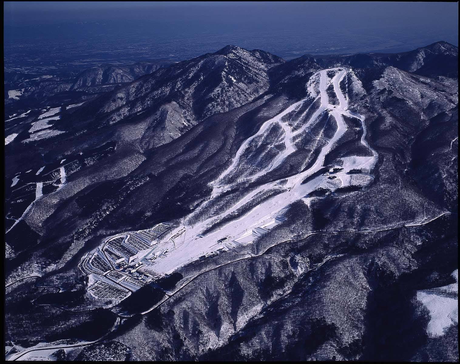 Hunter Mountain Shiobara in Japan: an aerial view of a ski resort and mountains.