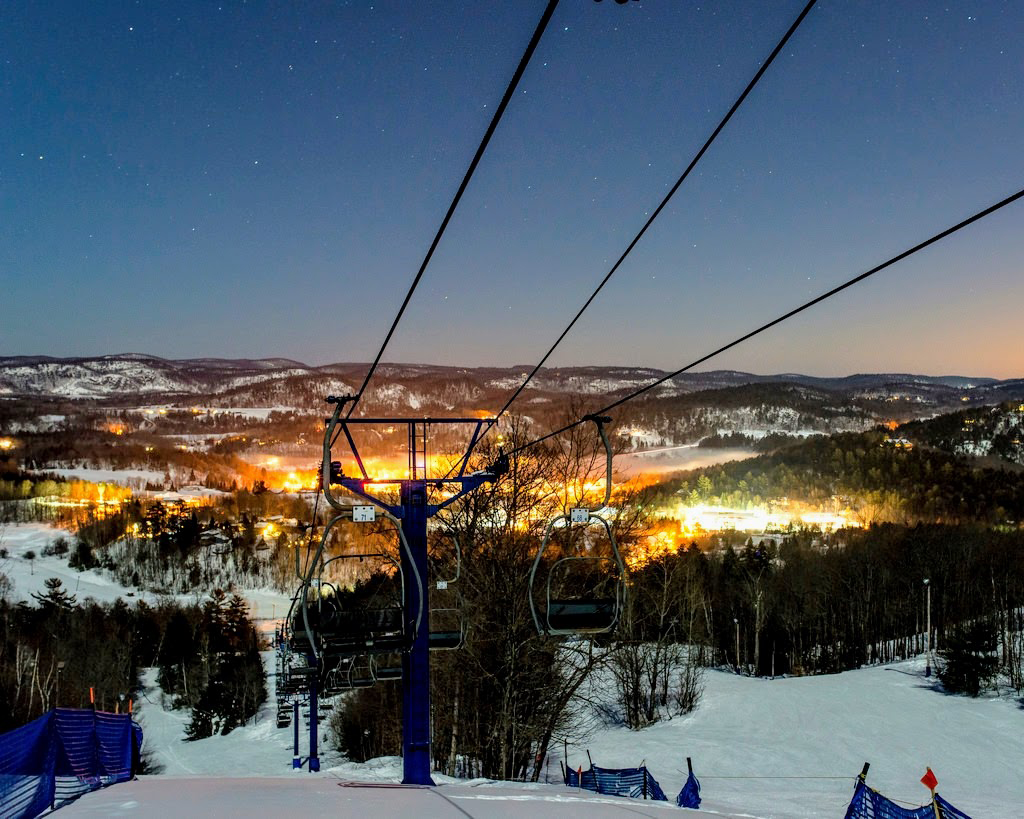 Mont Ste-Marie in Canada - the view from the top of a ski lift at night.