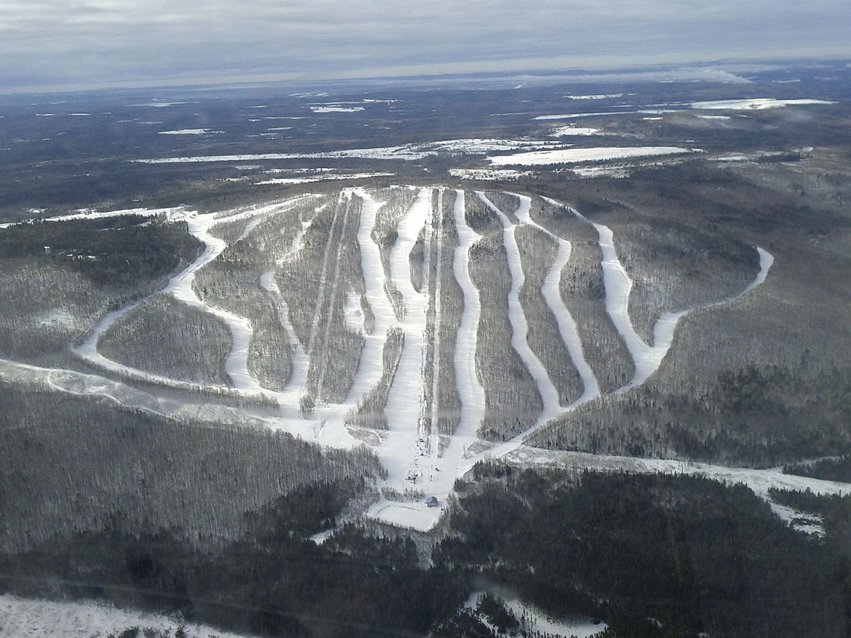 Crabbe Mountain in Canada - a view of a ski slope from an airplane.