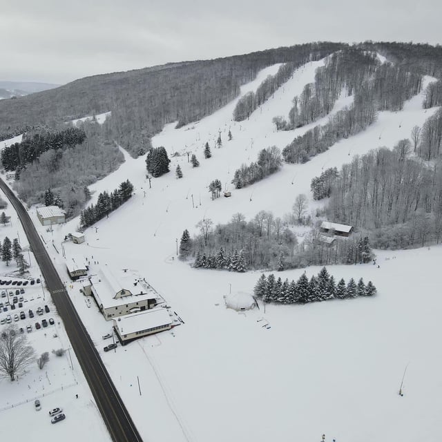 Song Mountain in USA: an aerial view of a ski resort in the mountains.