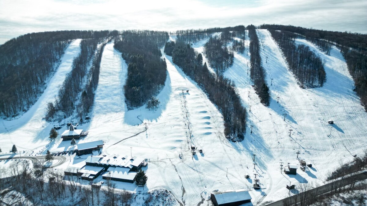 Song Mountain in USA: an aerial view of a ski resort in the mountains.