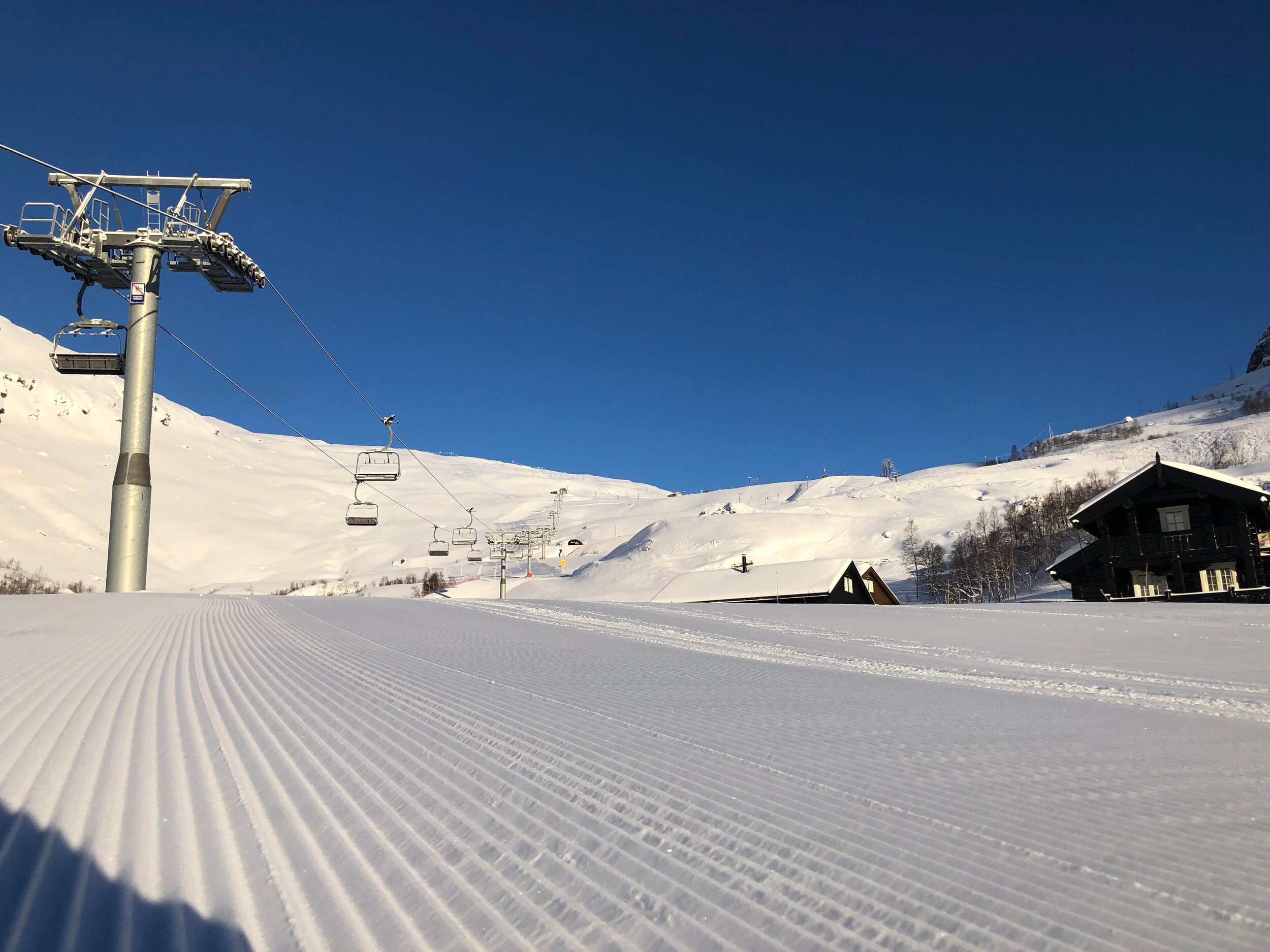 Røldal in Norway - a ski slope with a ski lift in the background.