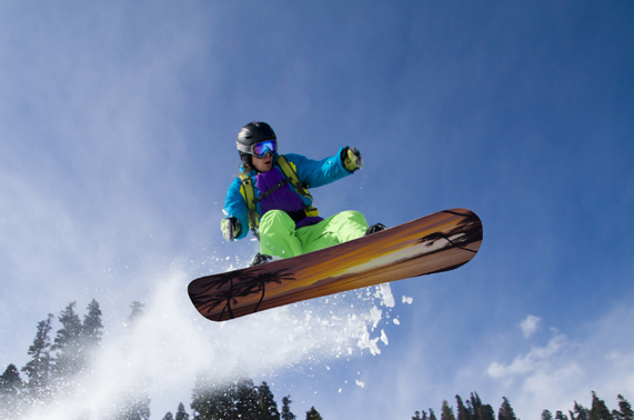 The Balsams in USA - a person jumping in the air on a snowboard.