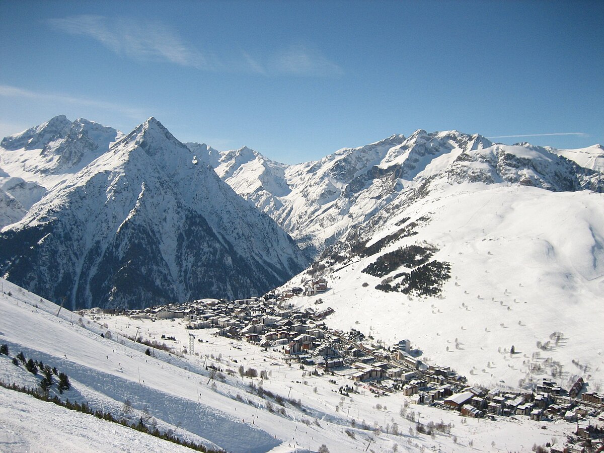 Les deux Alpes in France - snow covered mountains in the distance.