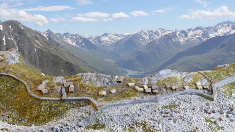 View of a charming chalet amidst a ski resort in Vichères, Switzerland. The winter scenery showcases a vibrant winter sports scene, complemented by the presence of a ski lift.