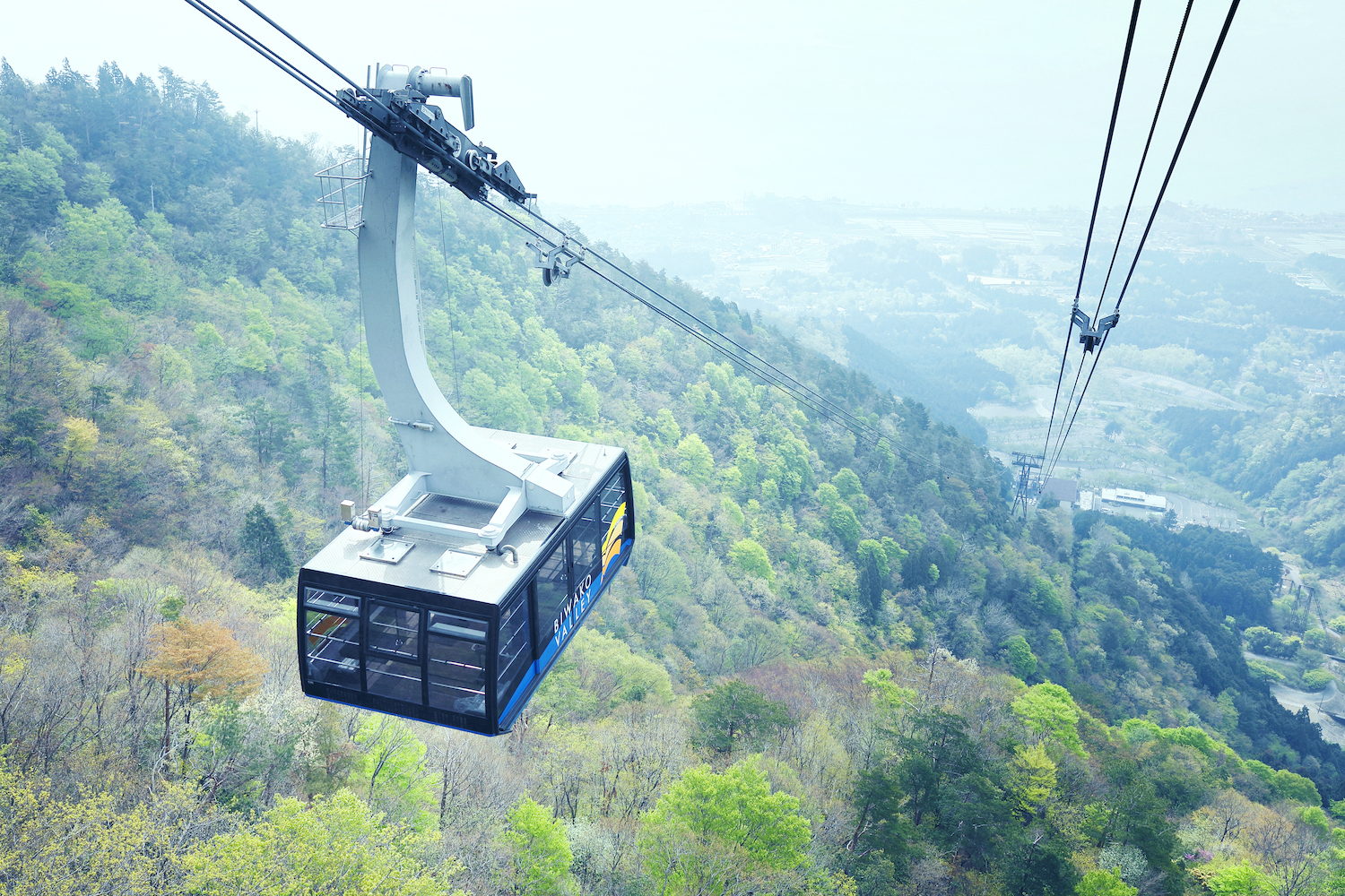 Biwako Valley in Japan - a cable car going up a mountain side.