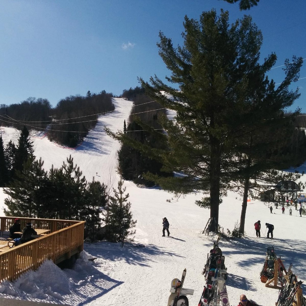 Antoine Mountain in Canada - a group of people skiing down a snowy hill.
