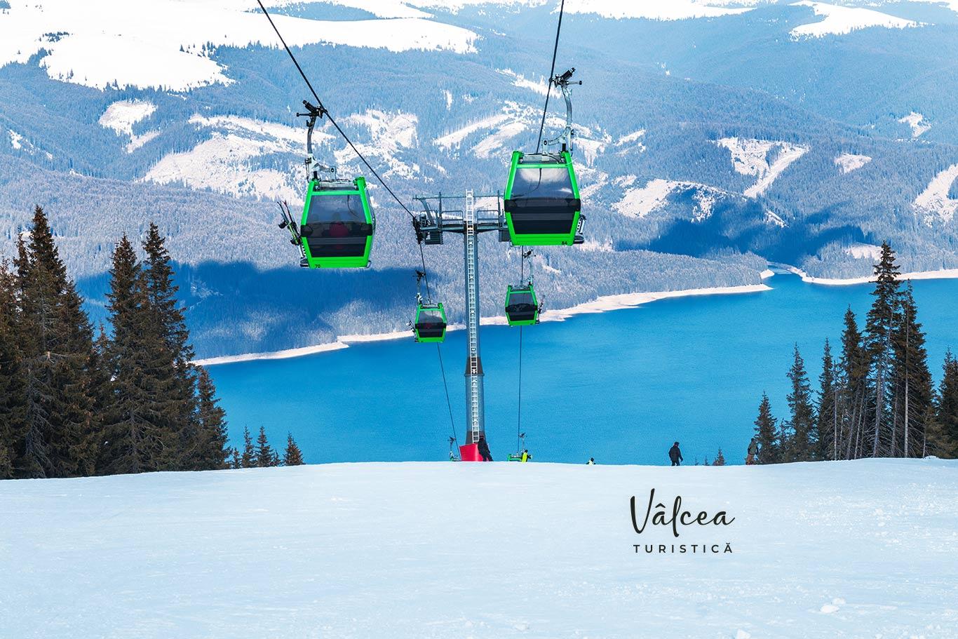 Transalpina – Vidra - Voineasa in Romania - a ski lift going up the side of a mountain.