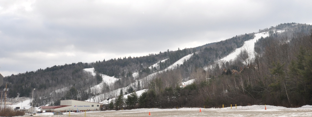 Crotched Mountain in USA - a snow covered ski slope with trees in the background.