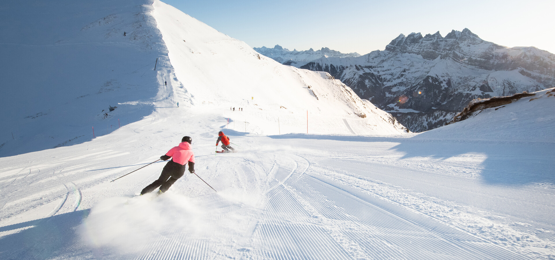 Les Portes du Soleil in Switzerland - a person skiing down a snow covered mountain.