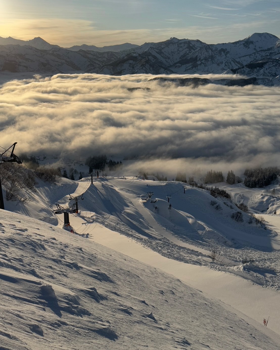 Suhara in Japan - a group of people skiing down a mountain.