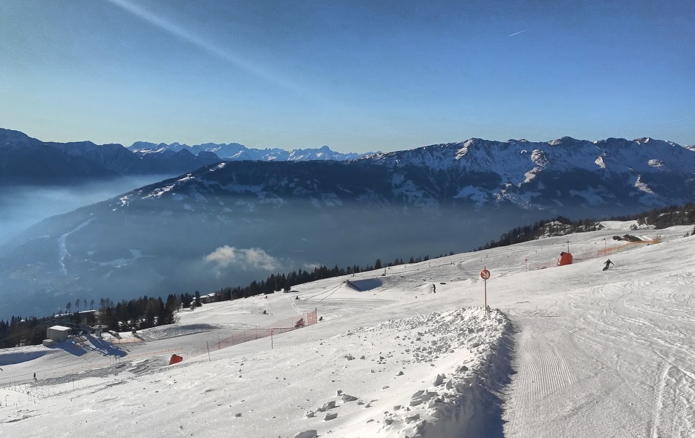 Zettersfeld Lienzer in Austria - a view from the top of a snowy mountain.