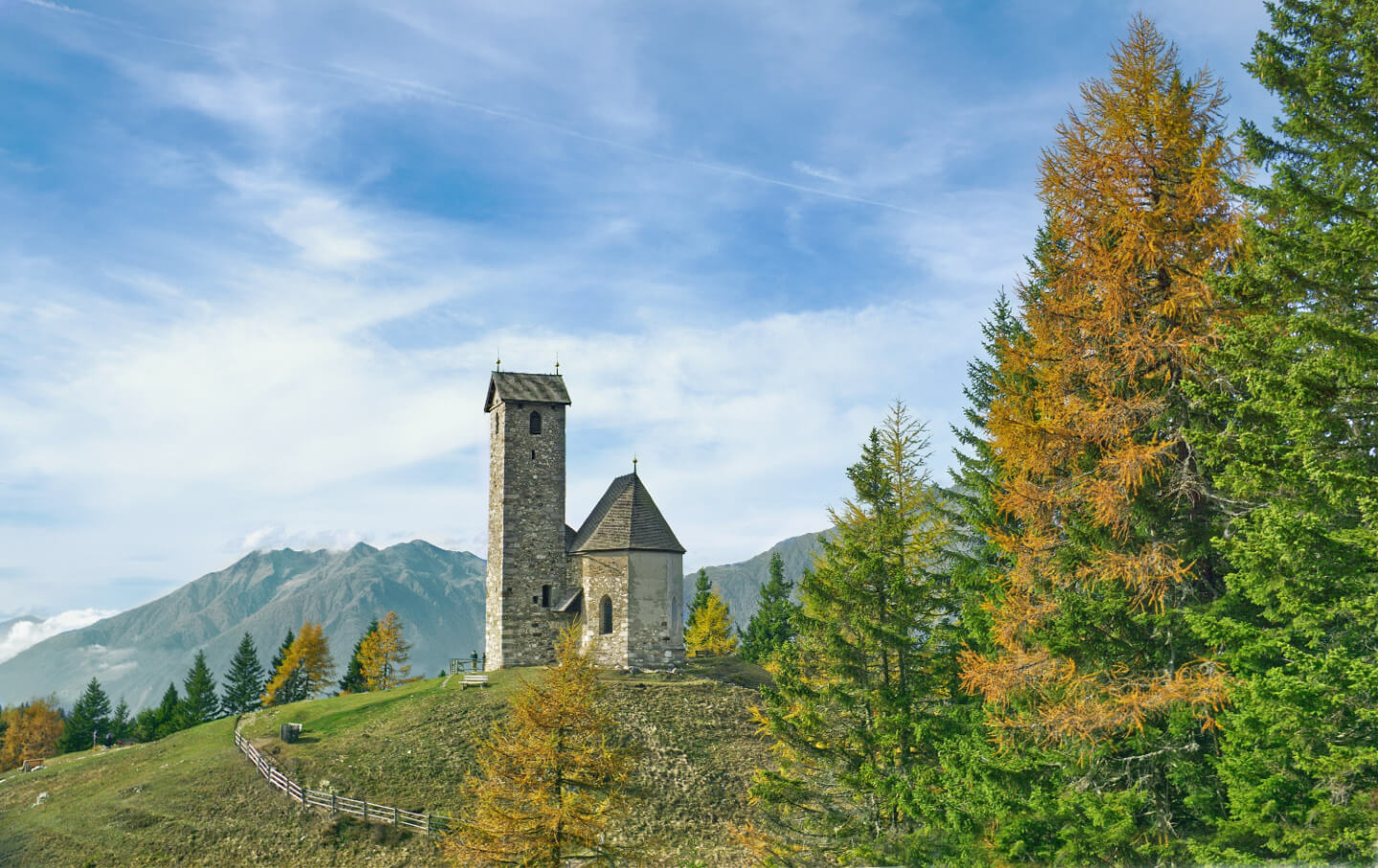 Vigiljoch – Lana in Italy - a church on a hill in the mountains.