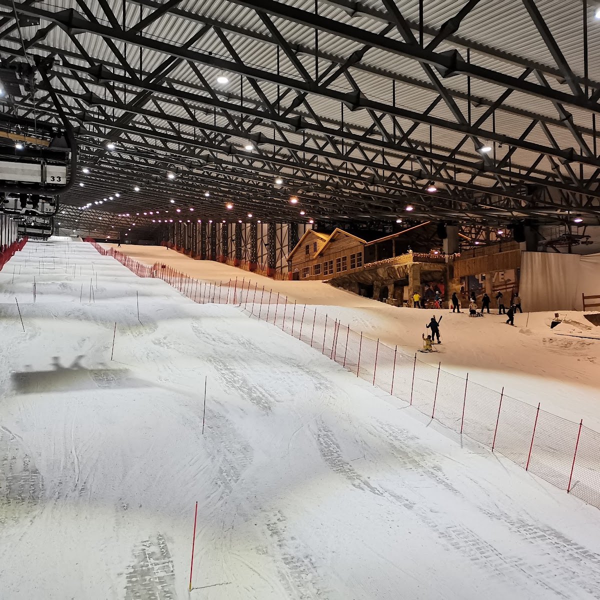 Snow Arena – Druskininkai in Lithuania: a snow covered ski slope in a building.