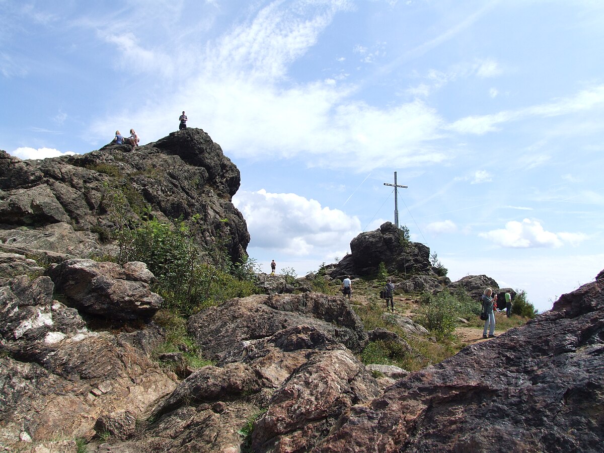 Silberberg – Bodenmais in Germany - a group of people standing on top of a mountain.