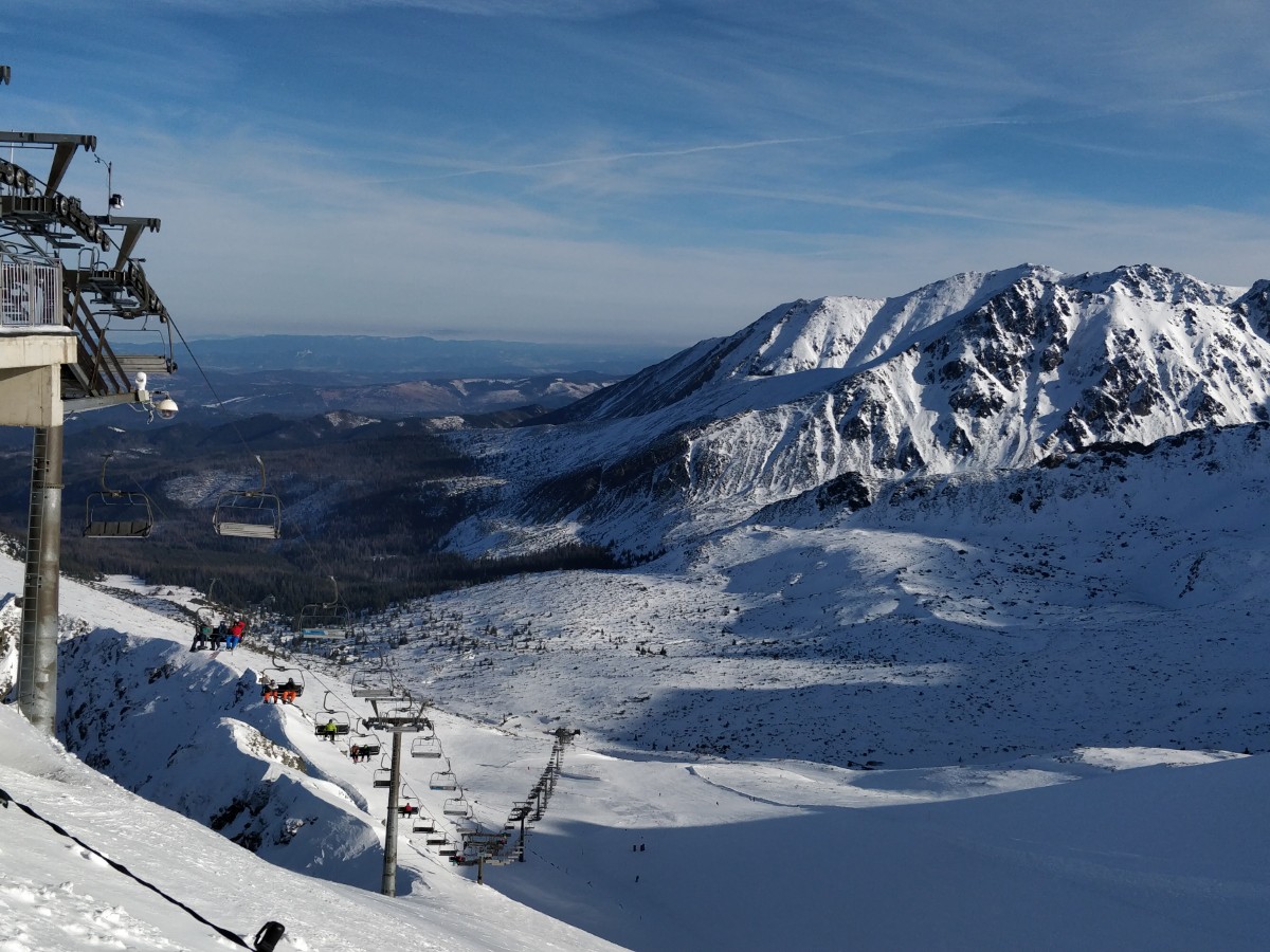 Kasprowy Wierch – Zakopane in Poland - a ski lift going up a snowy mountain.
