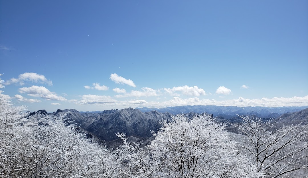A stunning winter scene in Karuizawa Japan showcasing snow-covered mountain terrain perfect for winter sports.