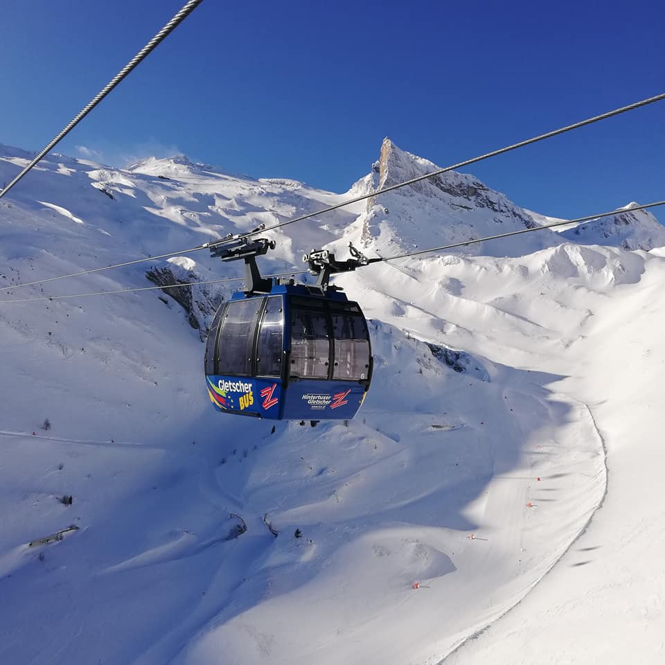Krinnenalpe in Austria - a ski lift going up a snowy slope.
