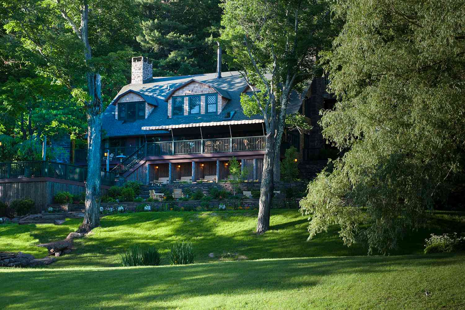 Deer Mountain in USA - a house on a hill surrounded by trees.