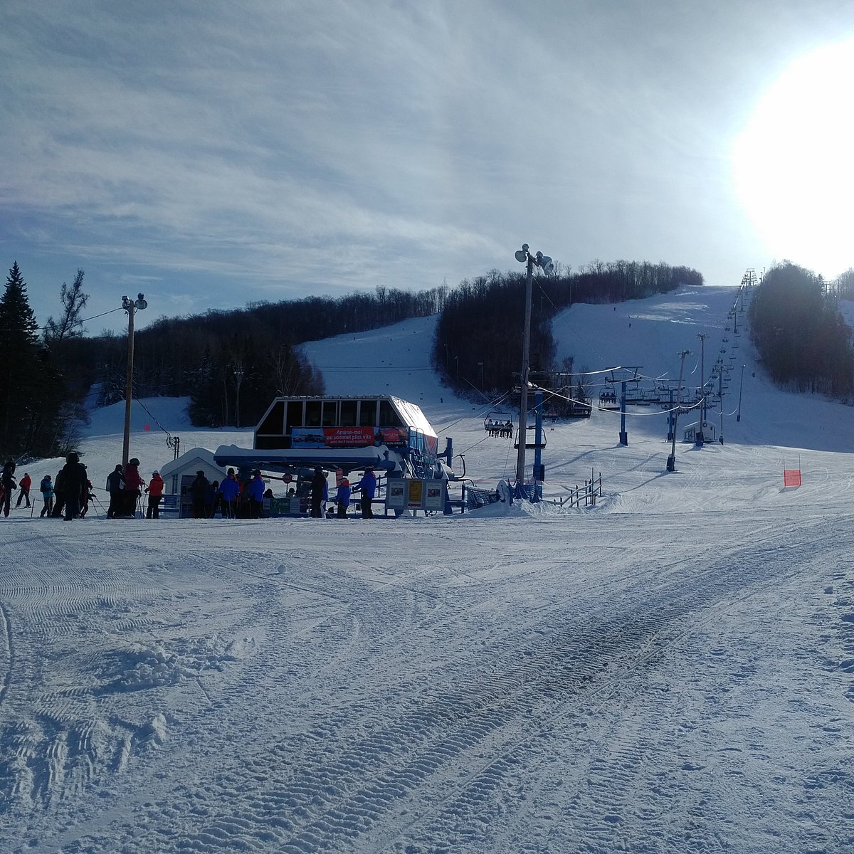 Ski Chantecler in Canada - a group of people standing on a ski slope.