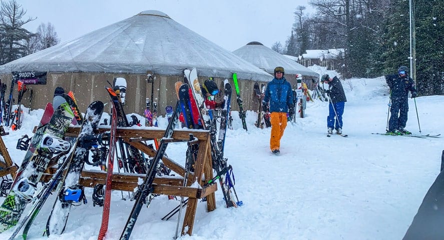 Mt Bohemia in USA - a group of people that are standing in the snow.