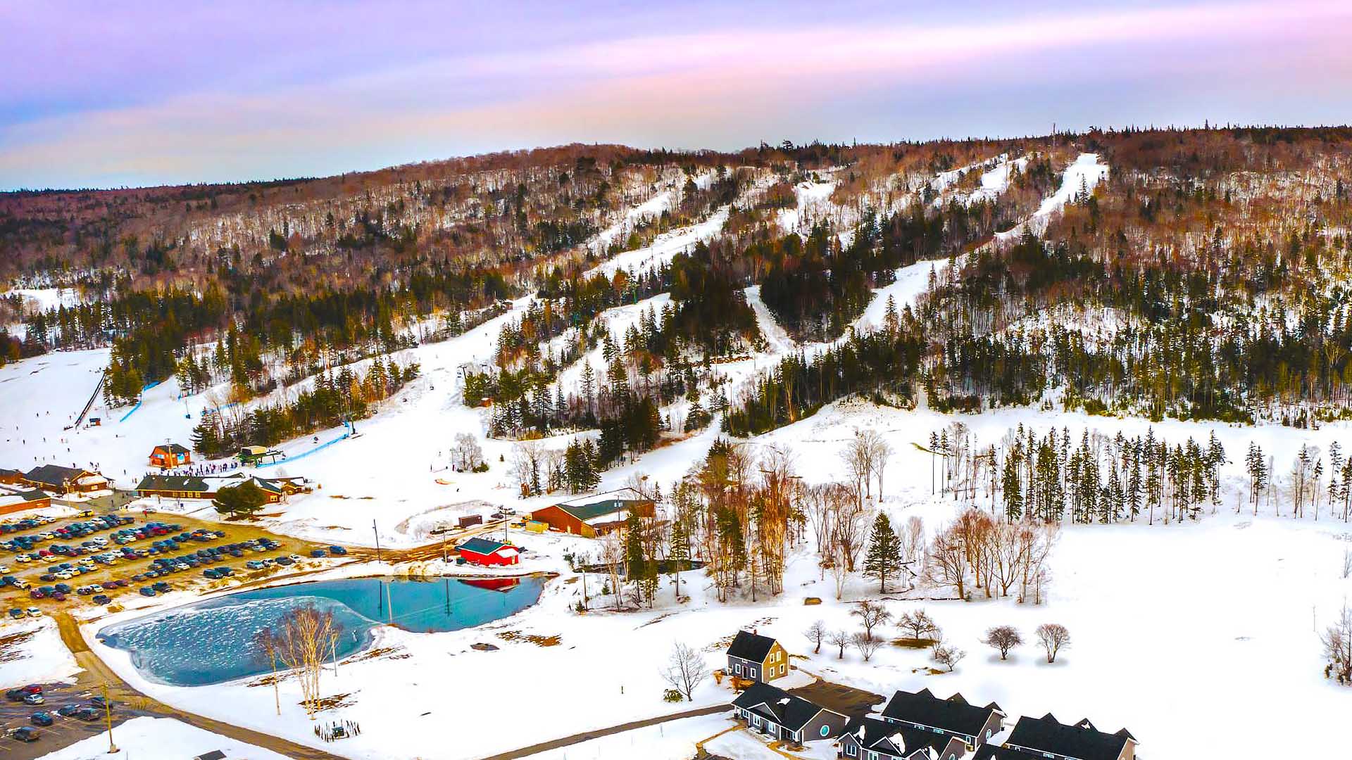 Ski resort in Ben Eoin, Nova Scotia, featuring winter sports activities. Scenic winter wonderland with a ski lift seen against the stunning winter landscape.