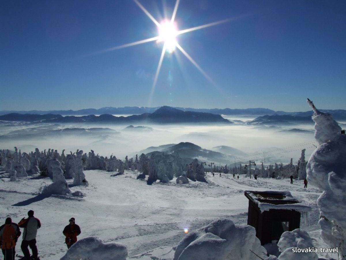Kubínska hoľa in Slovakia - a group of people standing on top of a mountain.