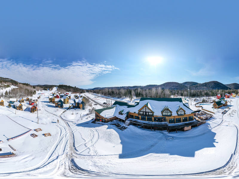 A lush winter scenery at Pin Rouge Ski Resort in New Richmond Quebec showcasing the thrill of winter sports amidst the stunning landscape of Gaspésie-Îles-de-la-Madeleine.