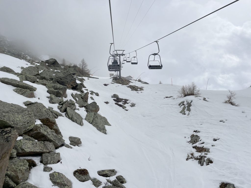 Heidbodme – Saas-Almagell in Switzerland - a ski lift going up a snowy mountain.