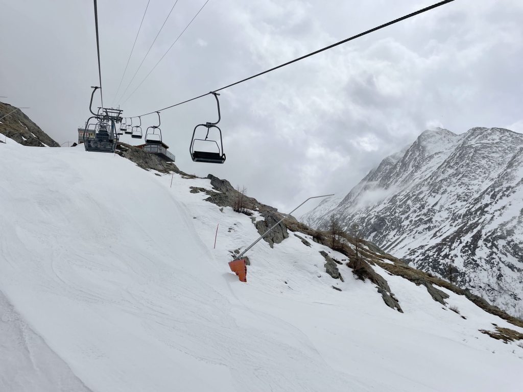 Heidbodme – Saas-Almagell in Switzerland - a ski lift going up a snowy slope.
