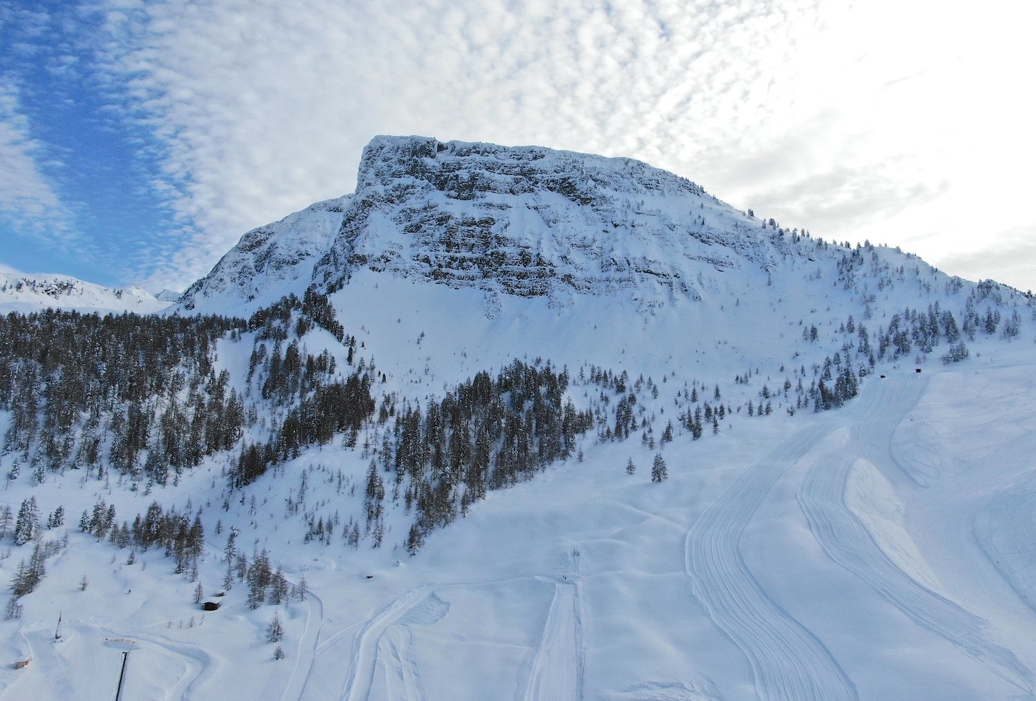 Gerlosstein in Austria - a mountain covered in snow under a blue sky.